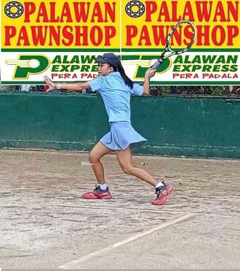 KATHLYN Bugna flaunts her dominance en route to bagging three titles in the Lapu-Lapu City National Junior Tennis Championships yesterday in Cebu.