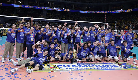 The NU Bulldogs whoop it up after finishing off the FEU Tamaraws, 25-16, 28-26, 25-23, to win the UAAP Season 87 men’s volleyball crown on Saturday at the Mall of Asia Arena.