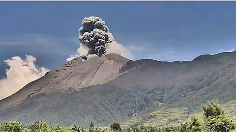 (FILES) THICK ash plumes billow 800 meters above Mount Kanlaon’s restless summit, swirling west-northwest like ominous smoke signals sent from a brewing storm.