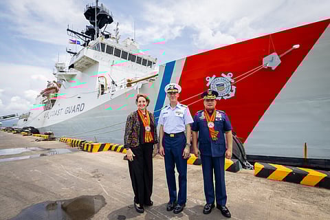 (From left) U.S. Ambassador MaryKay Carlson, U.S. Coast Guard (USCG) Cutter Stratton Commanding Officer Captain Brian Krautler, and Philippine Coast Guard (PCG) Commandant Admiral Ronnie Gil Gavan stand before the USCGC Stratton at the Puerto Princesa Port in Palawan on May 16.