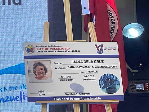 The Valenzuela LGU showcases a sample of the new PWD and senior citizen ID, featuring a hologram designed to combat the proliferation of tampered IDs.