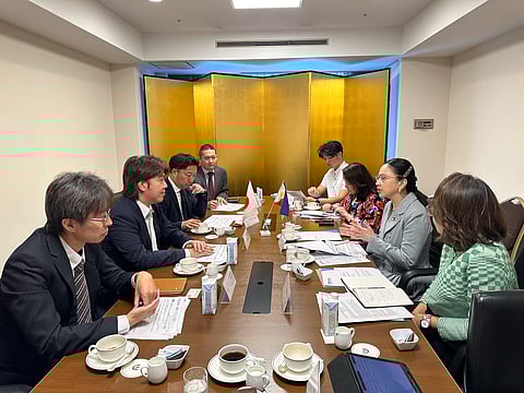 Trade Secretary Cristina Roque (in gray suit, center, right row) discusses with executives of Japanese retail powerhouse Pan Pacific International Holdings Corporation the various advantages of including Filipino products in their thrift stores, during a meeting in Tokyo, Japan, on Monday, 18 May 2025.