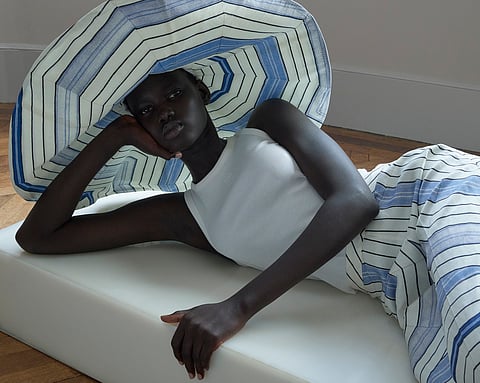 THE collection celebrates women without claiming militant feminism and appreciates fashion without succumbing to the excesses of ultraconsumerism.