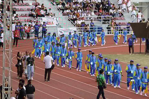The spirit of sportsmanship and camaraderie is in full display in the smiles of student-athletes enjoying their march in the traditional Parada ng mga Atleta during the 65th Palarong Pambansa opening ceremonies Saturday at the Ferdinand E. Marcos Memorial Stadium in Laoag City, Ilocos Norte.