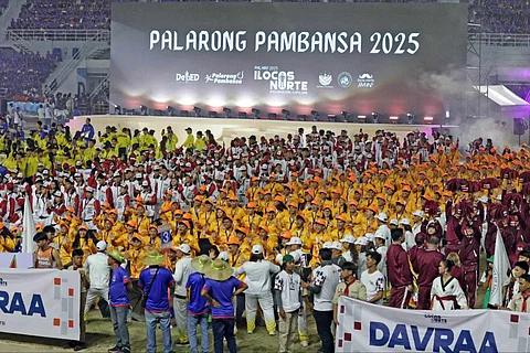 STUDENT-ATHLETES from different regions stand side by side in celebration of friendship and camaraderie during the 65th Palarong Pambansa opening ceremonies before plunging into fierce competition.