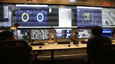 Metro Manila Development Authority (MMDA) personnel monitor traffic violations through CCTV cameras installed at key locations across Metro Manila, from the MMDA Command Center in Pasig City. This comes as the agency begins full implementation of the No Contact Apprehension Program (NCAP), which enforces traffic rules by capturing violations via video footage. Notices of violation will be sent directly to the registered address of the vehicle owner, in line with MMDA guidelines.