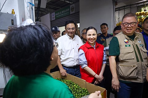 WHILE she announced a 60-day price freeze in Samar and Mindanao provinces, Trade Secretary Cristina Roque (center) and Agriculture Secretary Francis Tiu Laurel Jr (right), with Muntinlupa City Mayor Ruffy Biazon inspected Alabang Central Market to monitor prices of pork, rice, meat, poultry, and other key goods, ensuring compliance with the Maximum Suggested Retail Price.