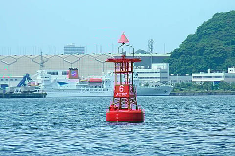 China removes last buoy from Japan waters