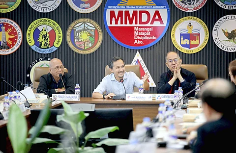 Department of Transportation Secretary Vince Dizon (center) speaks to officials of the Metropolitan Manila Development Authority during a briefing at the MMDA headquarters on Friday.