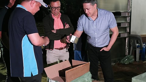 BIR Commissioner Romeo Lumagui Jr. (rightmost) inspected illegal vape pods in a Marilao, Bulacan last 8 May.