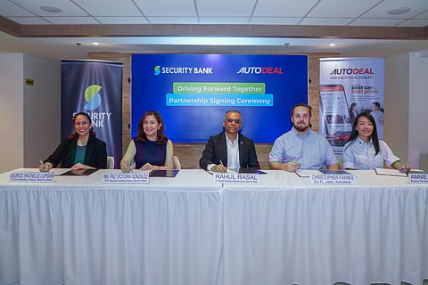 Security Bank and AutoDeal officials signed papers for their partnership last 21 May at the Security Bank Centre in Makati City.