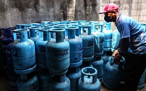 STACKS of LPG cylinders at a retail outlet in Metro Manila. LPG prices continue to drop this June, marking the fourth straight month of rollbacks.