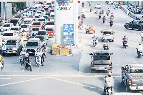 Surveillance warning A weatherworn No-Contact Apprehension Policy sign, leaning like a forgotten sentinel, stands along both lanes of Araneta Avenue, mirroring NCAP’s fate, maybe?