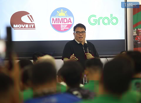 METROPOLITAN Manila Development Authority Chairman Don Artes, along with Traffic Discipline Office head Victor Nuñez and Special Operations Group Strike Force head Gabriel Go, speaks with MOVE IT and Grab drivers about the NCAP rules during a forum at the Asenso Center on A. Bonifacio Avenue, Barangka, Marikina City, on Saturday.