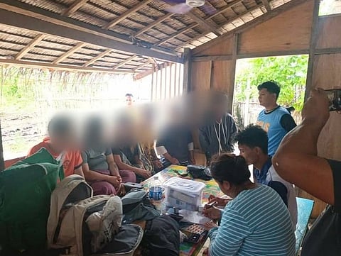 SURVIVORS of the capsized boat in Balabac, Palawan undergo documentation and receive initial medical assistance at the Coast Guard substation in Barangay Bancalaan.