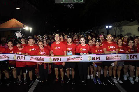 BANK of the Philippine Islands’ Corporate Race 2025 participants include (from third left, in front): BPI’s Ococ Ocliasa, head of business banking; Gina Eala, chief human resources officer; TG Limcaoco, president and CEO; Eric Luchangco, chief finance officer and chief sustainability officer; and Cathy Santamaria, chief customer and marketing officer.