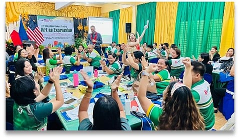 : English Language Specialists Shélynn Riel and Joe Voigts facilitate a session on using art as a medium for student engagement and effective communication.