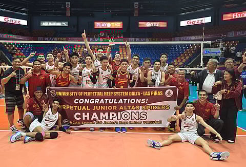 MEMBERS of the Perpetual Junior Altas cheer after bagging the NCAA Season 100 junior boys’ volleyball title late Sunday at the Filoil EcoOil Arena in San Juan.