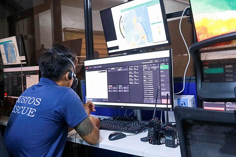 Calm under pressure A 911 call handler on duty at the Bustos, Bulacan command center, ready to respond to emergencies with focus and dedication.