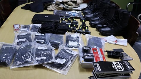 TACTICAL gear, including gloves, zip cuffs, and window breakersdonated by the Filipino-American Law Enforcement Organization to the Manila Airport Police.