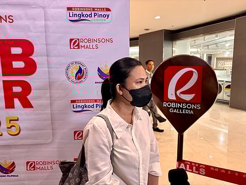 EARLY Joy De San Jose, one of the hired on the spot applicants in the Department of Migrant Workers' job fair held in celebration of the 127th Philippine Independence Day.