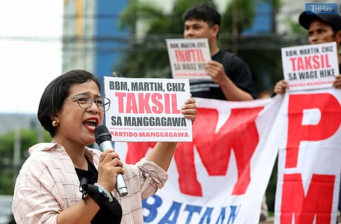 A MILITANT group staged a protest at Boy Scout Circle in Quezon City on Thursday, Independence Day, denouncing key government officials for their inaction on proposed wage hike legislation.
The protesters branded House Speaker Martin Romualdez, Senate President Chiz Escudero, and President Ferdinand Marcos Jr. as "traitors" for allegedly failing to certify the proposed P100–P200 legislated wage hike as urgent.