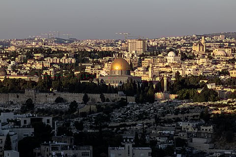 THE sun rises over Jerusalem and its landmark Dome of the Rock mosque on 13 June 2025. Israel carried out strikes targeting nuclear and military sites in Iran early on June 13, after US President Donald Trump warned of a possible "massive conflict" in the region.