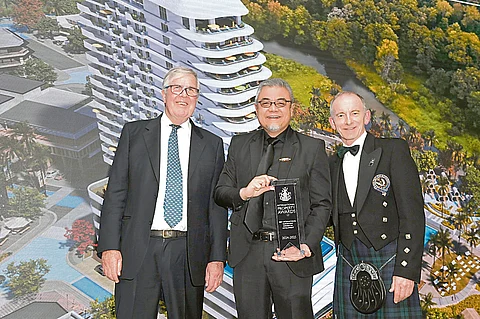 LANDCO executives accepting the IPA Award for World’s Best Sustainable Property.