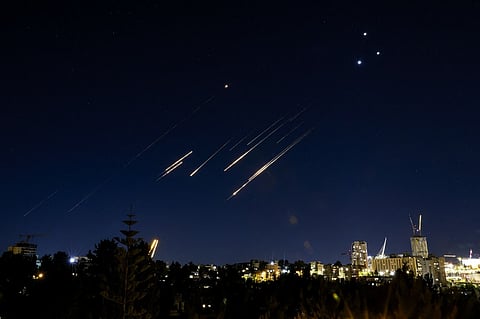 NO shooting stars: Missiles fired from Iran are pictured in the night sky over Jerusalem on June 14, 2025. Israel and Iran exchanged fire on 14 June, a day after Israel unleashed an unprecedented aerial bombing campaign that Iran said hit its nuclear facilities, "martyred" top commanders and killed dozens of civilians