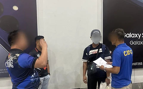 OFFICERS arrest a 23-year-old man wanted for rape at NAIA Terminal 3 upon arrival from Hong Kong.