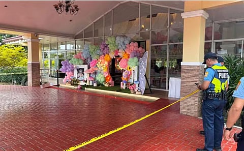 Authorities secure the crime scene where a House of Representatives official was shot during his daughter’s birthday party last 15 June 2025.