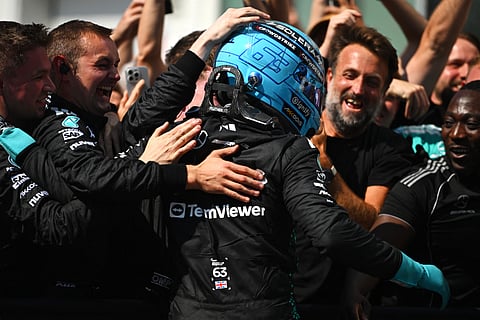 RACE winner George Russell of Great Britain and Mercedes AMG Petronas F1 Team celebrates with his team in parc ferme during the F1 Grand Prix of Canada at Circuit Gilles-Villeneuve on June 15, 2025 in Montreal, Quebec.