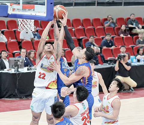 JHONARD Clarito soars for a rebound during Rain or Shine’s 92-89 win over NLEX in the quarterfinals of the PBA Philippine Cup last night at the Philsports Arena.