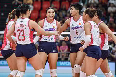 ALYSSA Valdez (middle) and the Creamline Cool Smashers