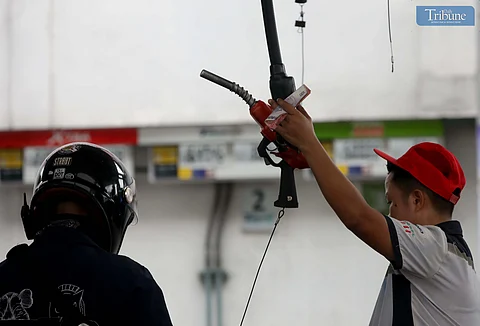 GAS station personnel assist motorists refueling at a station along East Avenue in Quezon City on Friday, 20 June. The Department of Energy warned that diesel prices may increase by up to P5 per liter next week due to rising global oil prices. President Ferdinand Marcos Jr. earlier said the government is prepared to provide fuel subsidies to sectors most affected by potential oil supply disruptions stemming from tensions between Israel and Iran.