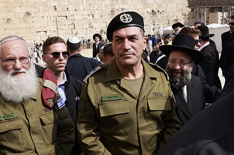 Israel's newly appointed armed forces chief, Lieutenant General Eyal Zamir (C), visits the Western Wall in the old city of Jerusalem on March 5, 2025. Zamir said during his inauguration on March 5 that Israel's mission to defeat Palestinian militant group Hamas was "not accomplished".