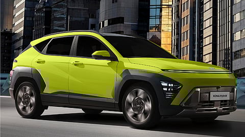 The all-new Hyundai KONA Hybrid stands out in Neoteric Yellow, bringing a bold and tech-forward look to city streets.