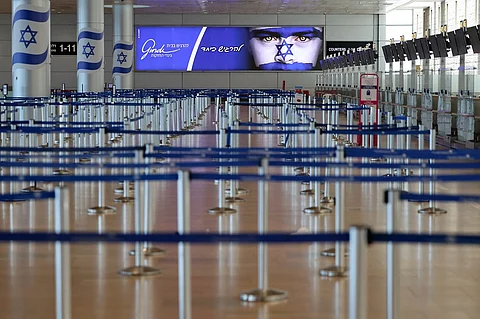 This picture shows the empty departure hall at Ben Gurion Airport near Tel Aviv on June 13, 2025 after Israel closed its air space to takeoff and landing. Israel pounded Iran in a series of air raids on June 13, striking 100 targets including Tehran's nuclear and military sites, and killing the armed forces' chief of staff, the head of Iran's Revolutionary Guards and top nuclear scientists. Iran launched 100 drones in response towards Israel whose defences were working to intercept, the Israeli military said.