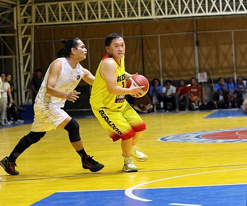 SENATOR Christopher ‘Bong’ Go makes his move in a friendly game following the opening of the 50-Up Basketball League at Ynares covered court inside the Greenwoods Executive Village in Cainta over the weekend.