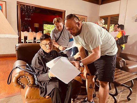 Director Adolf Alix and his mentor Director Joel Lamangan preps for a scene in “Unconditional”
