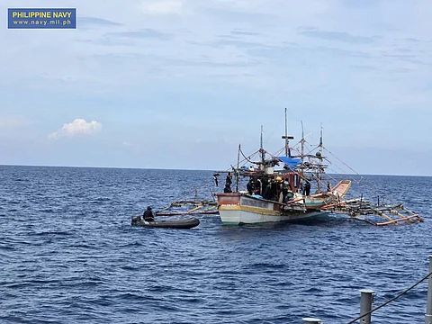 PHILIPPINE Navy personnel inspect the intercepted vessel off Zambales carrying P10 billion worth of suspected shabu, believed to be part of transnational drug operations linked to Chinese syndicates.