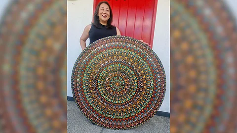 Th46-inch Mandala (red, teal, orange acrylic paint with craft mirrors).