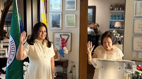 Picture says it all Mom Cynthia Villar, set to complete her third term as senator, administers the oath of office to Senator-elect Camille Villar — where else but at their Las Piñas home.