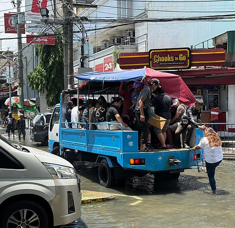 FREE rides are offered to stranded residents of Malabon reeling from perennial high-tide induced floods.