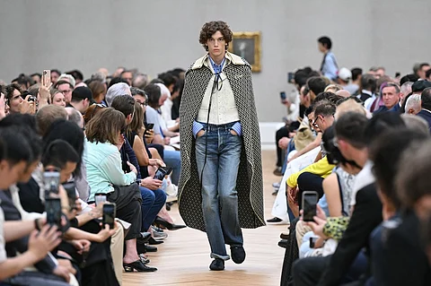 A model presents a creation by Dior Homme for the Menswear Ready-to-wear Spring-Summer 2026 collection as part of the Paris Fashion Week in Paris, on June 27, 2025.