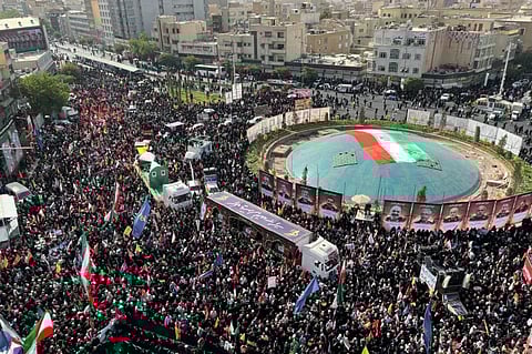 Iran holds state funeral for slain top brass