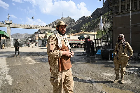 TALIBAN security personnel stand guard near the zero point at the Torkham International Border Crossing between Afghanistan and Pakistan, in Nangarhar province, on April 20, 2025. Pakistan has launched a strict campaign to evict by the end of the month more than 800,000 Afghans who have had their residence permits cancelled, including some who were born in Pakistan or lived there for decades.