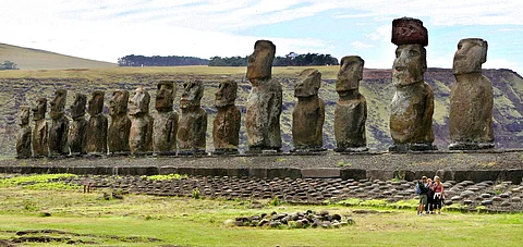The 15 Tongariki moai, standing erect in rigid military attention, are the largest statues on the island.