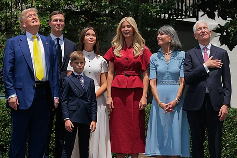 WASHINGTON, DC - JUNE 18: (L-R) U.S. President Donald Trump, Jared Kushner, his children Arabella and Theodore, Ivanka Trump, Seryl Kushner and U.S. Ambassador to France Charles Kushner attend a flag-raising ceremony on a newly installed pole on the South Lawn of the White House on June 18, 2025 in Washington, DC. President Trump had two 100 foot flagpoles installed on the White House grounds as part of a “personal project” that Trump said he personally paid for.