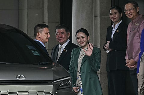 THAILAND’S ousted Prime Minister Paetongtarn Shinawatra (center) gestures next to Thailand’s Deputy Prime Minister Phumtham Wechayachai (second from left) after a press conference following her suspension by the country’s Constitutional Court on 1 July 2025.